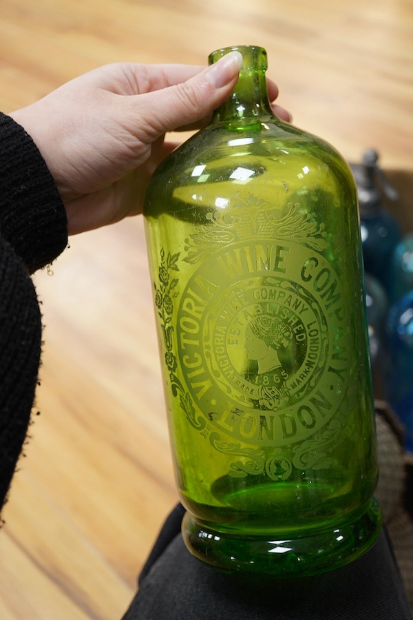 An Edwardian Standard English Seltzogenes double gourd Soda Syphon, one other and a collection of coloured glass bottles. Condition - varies